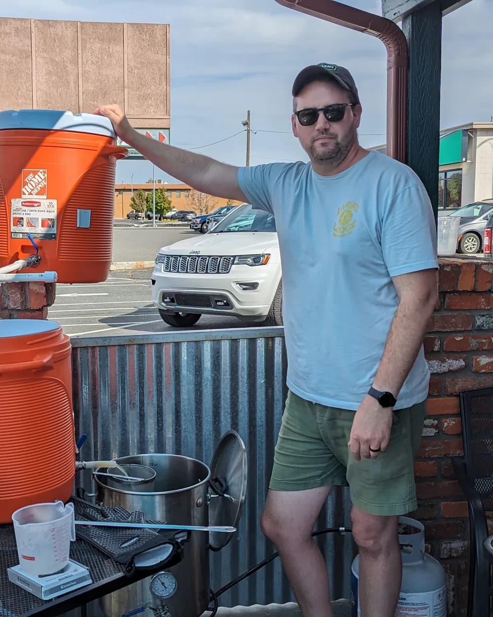 Josh brewing on the patio at his shop